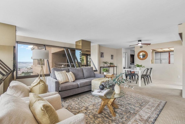 230 W Laurel St Unit 506, San Diego, CA 92101 - living area with carpet floors, healthy amount of natural light, and ceiling fan