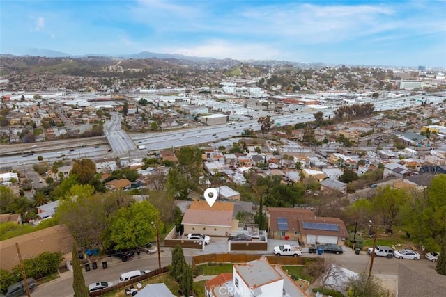 aerial view with a mountain view and a residential view