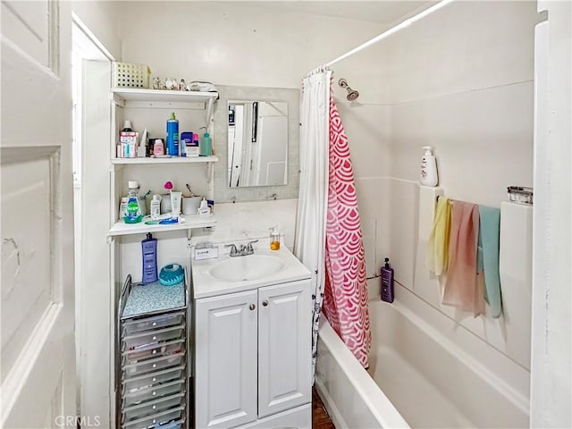 bathroom with shower / tub combo with curtain and vanity