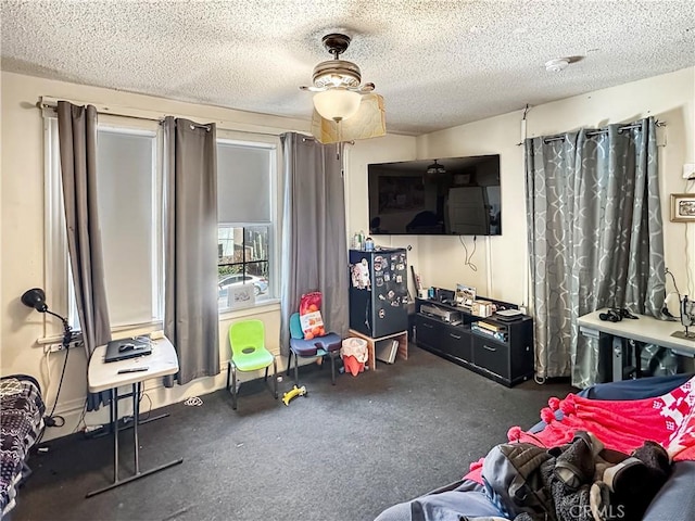 rec room with a textured ceiling