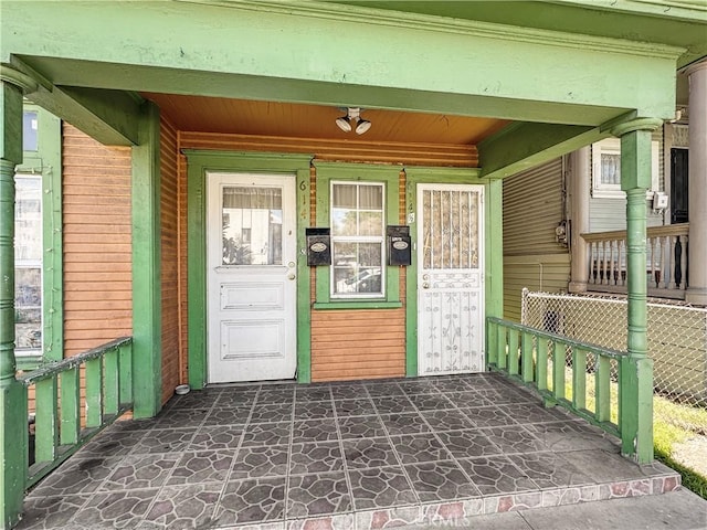 entrance to property with a porch