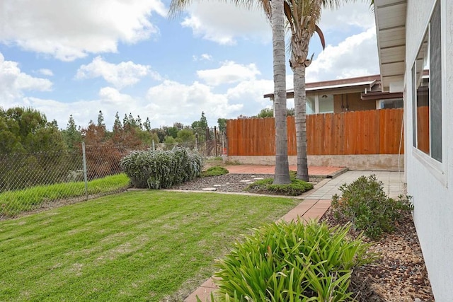 view of yard with fence