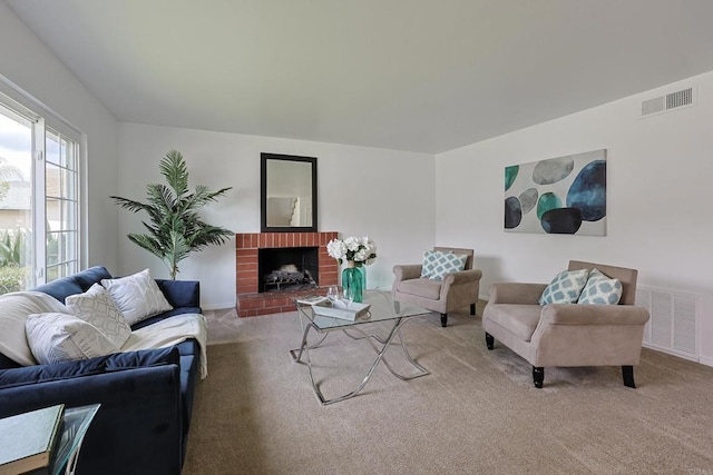 living area with baseboards, a fireplace, visible vents, and carpet floors