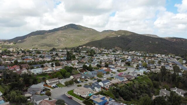 aerial view with a mountain view and a residential view