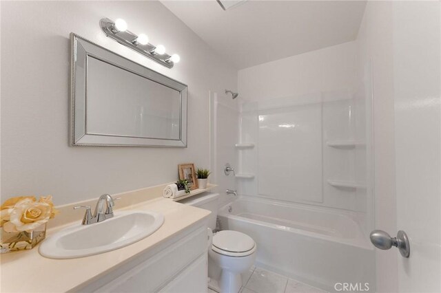 581 Springbrook N, Irvine, CA 92614 - full bathroom featuring tile patterned floors, vanity, shower / bathing tub combination, and toilet