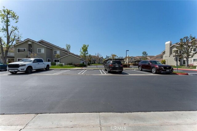 581 Springbrook N, Irvine, CA 92614 - view of street with sidewalks, curbs, and a residential view