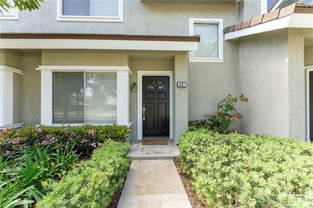 581 Springbrook N, Irvine, CA 92614 - entrance to property featuring stucco siding