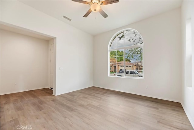 1984 Bronte Rd, San Jacinto, CA 92583 - empty room with light wood-style flooring, baseboards, ceiling fan, and visible vents