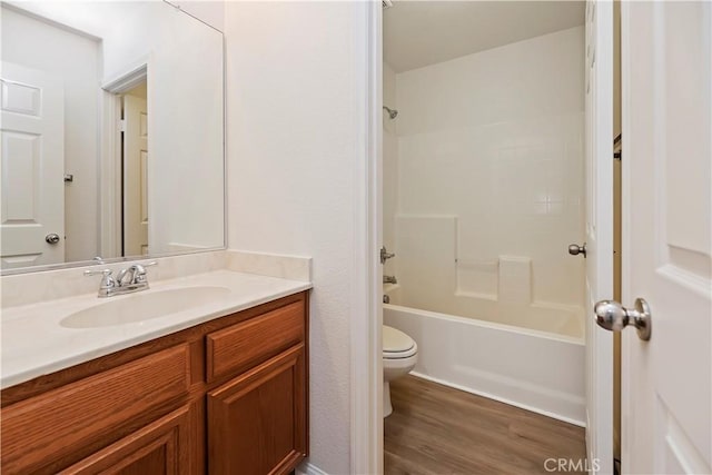 1984 Bronte Rd, San Jacinto, CA 92583 - full bath featuring shower / bathing tub combination, wood finished floors, toilet, and vanity