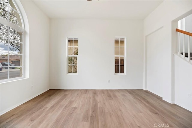 1984 Bronte Rd, San Jacinto, CA 92583 - unfurnished room with stairs and wood finished floors