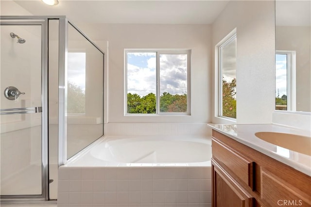 1984 Bronte Rd, San Jacinto, CA 92583 - bathroom featuring vanity, a bath, and a shower stall