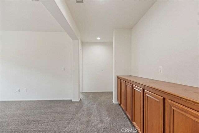 1984 Bronte Rd, San Jacinto, CA 92583 - hallway with light carpet, baseboards, and recessed lighting