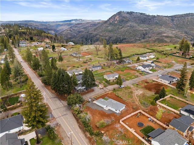 bird's eye view with a mountain view