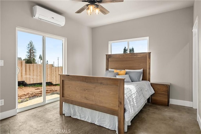 bedroom with baseboards, a ceiling fan, access to exterior, and a wall mounted AC