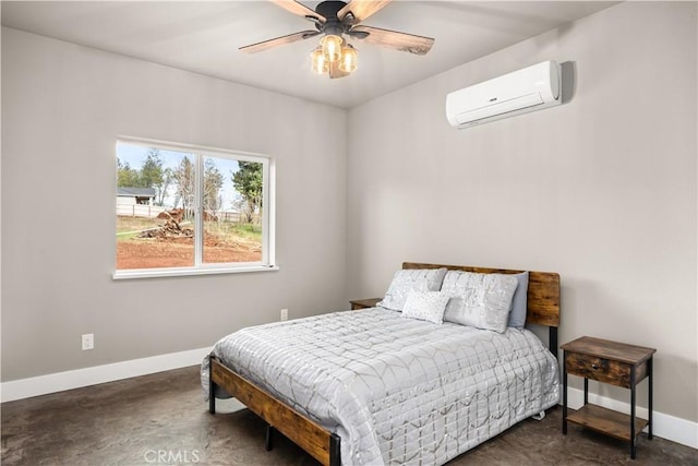 bedroom featuring baseboards, concrete floors, ceiling fan, and a wall mounted air conditioner