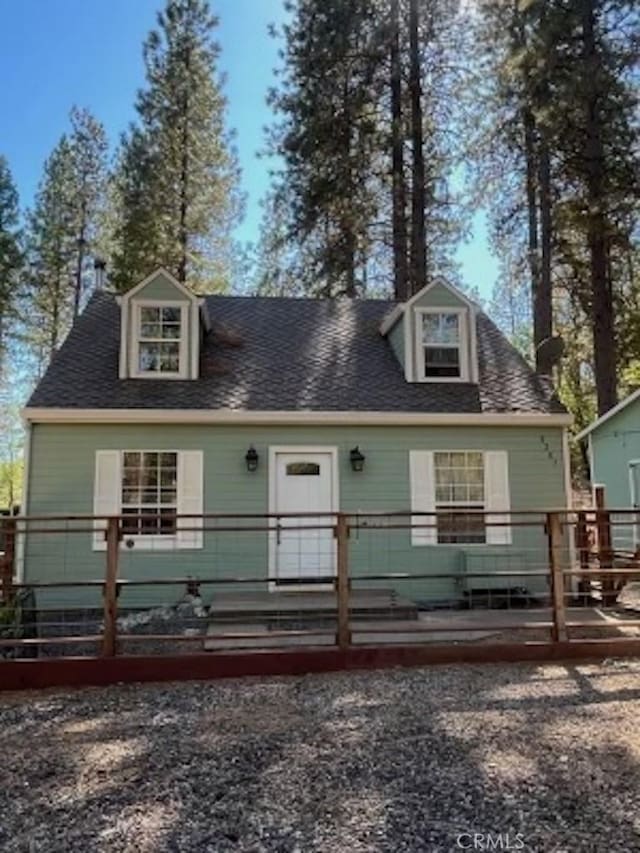 view of front of property featuring a deck