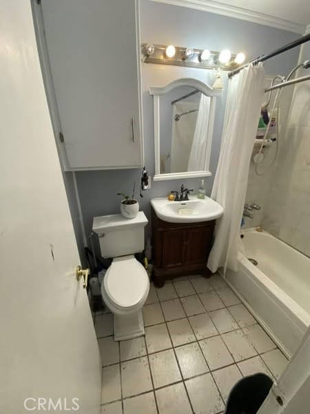 21337 Archibald Ave, Carson, CA 90745 - full bath with tile patterned flooring, shower / bath combo, vanity, toilet, and ornamental molding