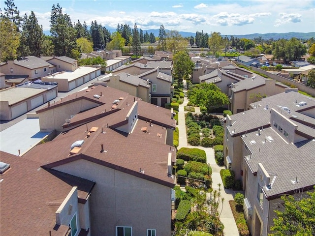 birds eye view of property with a residential view