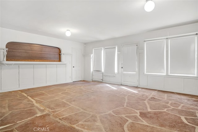 interior space featuring stone finish floor