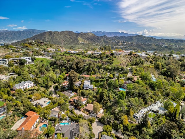 drone / aerial view featuring a mountain view