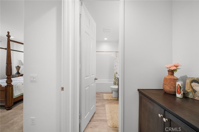 corridor with recessed lighting and light wood-type flooring