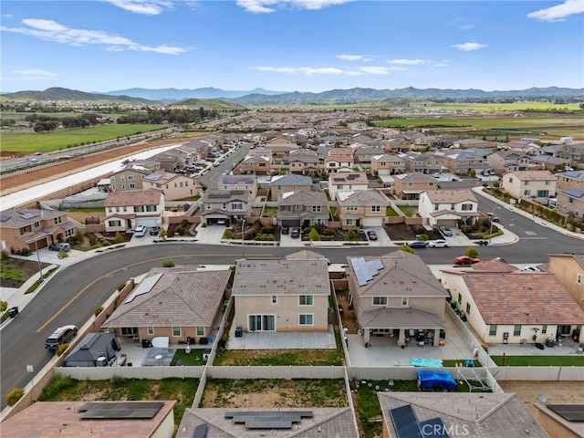 bird's eye view with a residential view and a mountain view