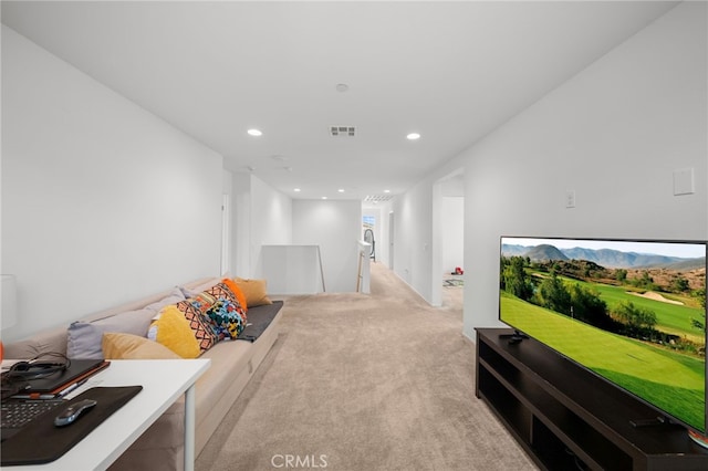 rec room with visible vents, recessed lighting, and light colored carpet