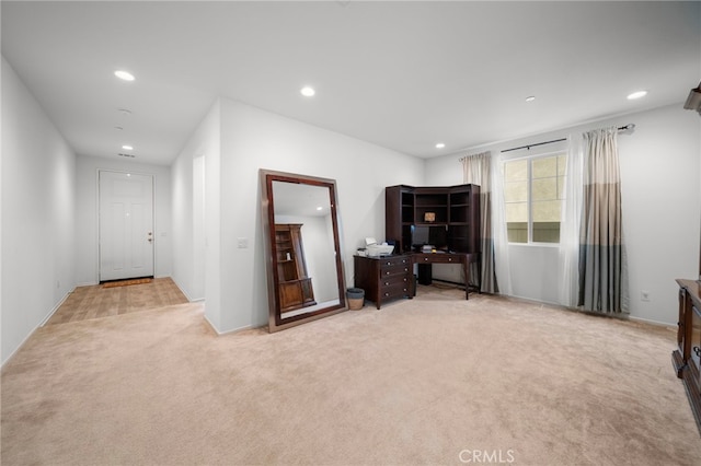 interior space featuring carpet flooring and recessed lighting