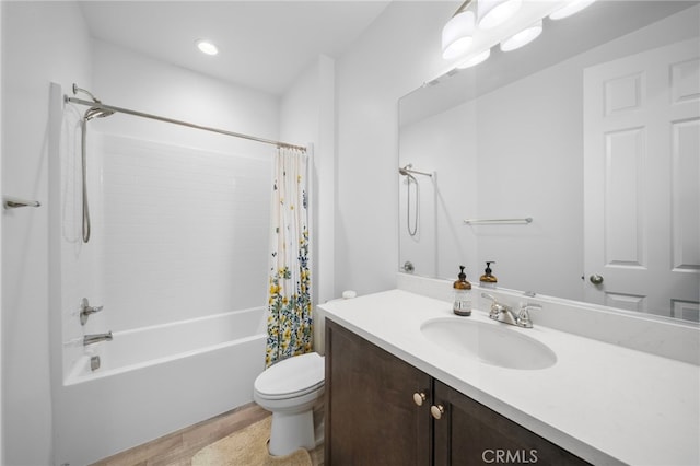 bathroom featuring toilet, vanity, and shower / bathtub combination with curtain
