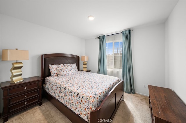 bedroom with light carpet