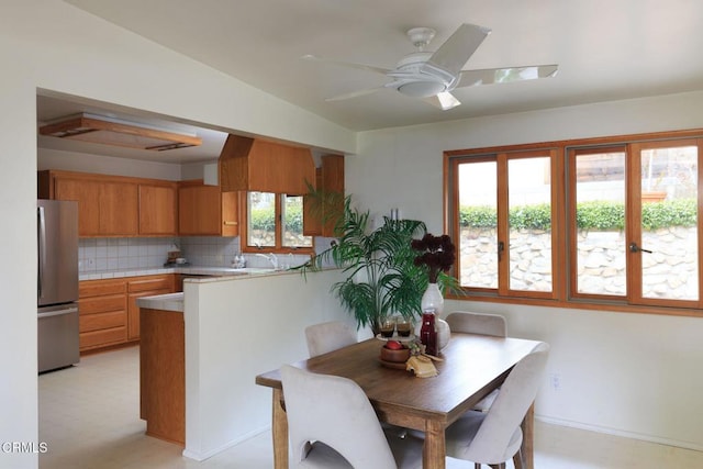 dining area featuring a ceiling fan