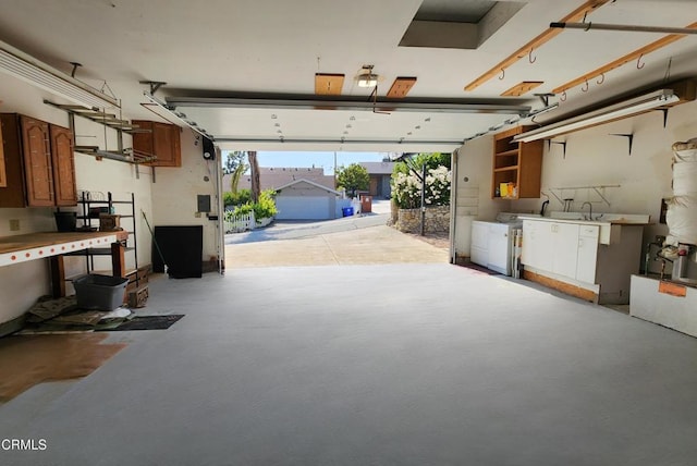 garage featuring washer and dryer
