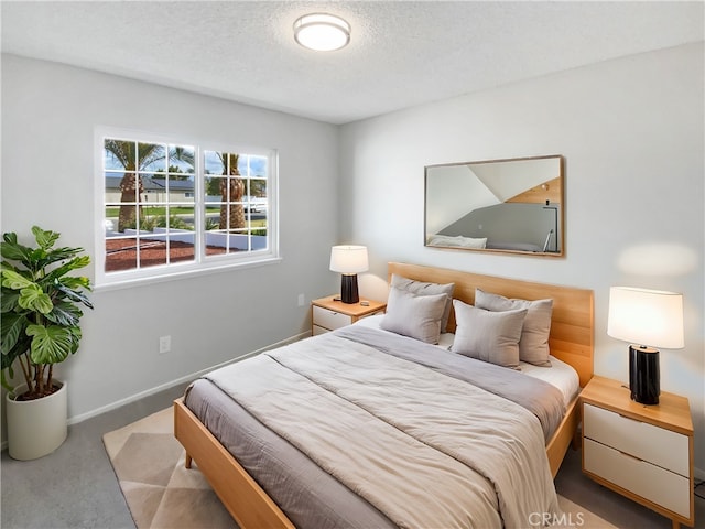 4739 Belmont Pl, Chino, CA 91710 - bedroom with a textured ceiling, carpet flooring, and baseboards