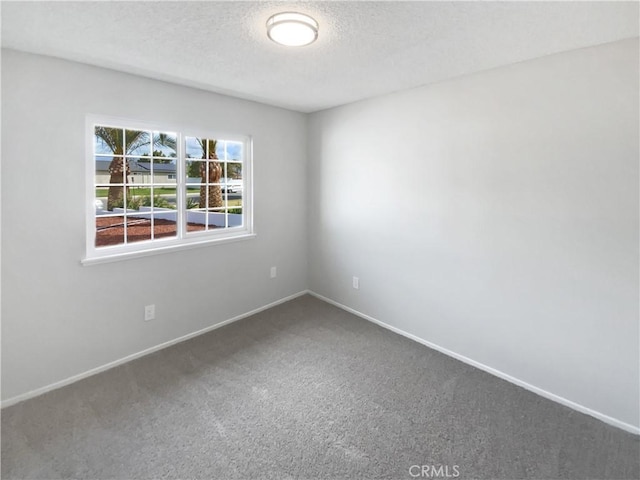 4739 Belmont Pl, Chino, CA 91710 - spare room with carpet flooring, baseboards, and a textured ceiling