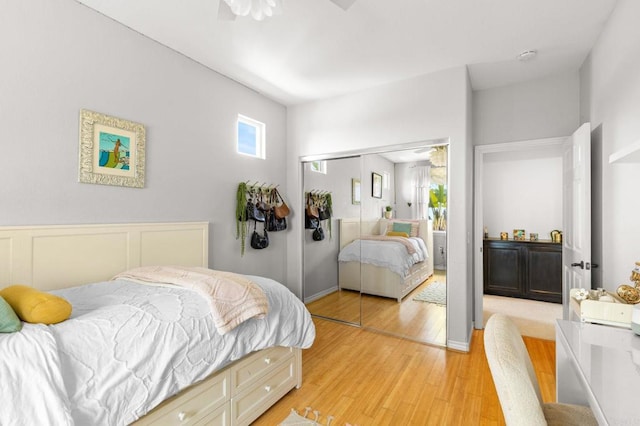 6497 Wayfinders Ct, Carlsbad, CA 92011 - bedroom with light wood-style floors and a closet