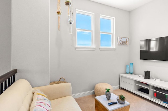 6497 Wayfinders Ct, Carlsbad, CA 92011 - living room featuring baseboards and light colored carpet