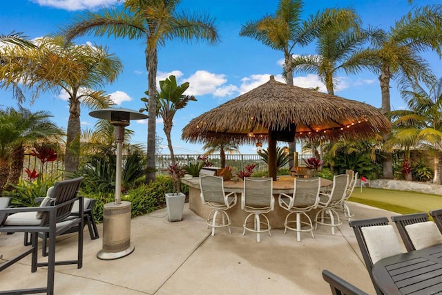 6497 Wayfinders Ct, Carlsbad, CA 92011 - fenced backyard featuring a patio and outdoor dining area