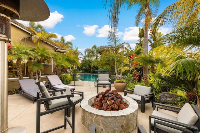 6497 Wayfinders Ct, Carlsbad, CA 92011 - view of patio / terrace featuring an outdoor pool and an outdoor living space with a fire pit