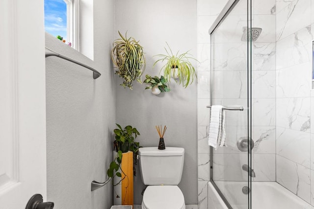 6497 Wayfinders Ct, Carlsbad, CA 92011 - bathroom featuring shower / bath combination with glass door and toilet