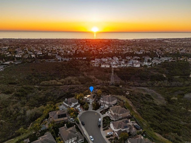6497 Wayfinders Ct, Carlsbad, CA 92011 - aerial view at dusk of a residential view and a water view