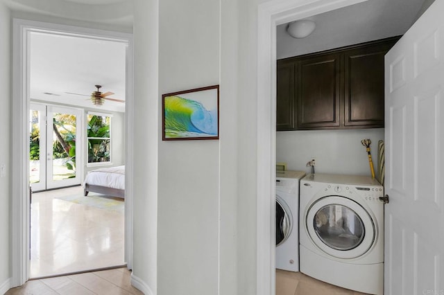 6497 Wayfinders Ct, Carlsbad, CA 92011 - laundry area with washing machine and dryer, cabinet space, a ceiling fan, and light tile patterned floors