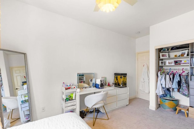 6497 Wayfinders Ct, Carlsbad, CA 92011 - bedroom with light colored carpet, a ceiling fan, and a closet