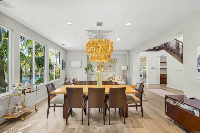 6497 Wayfinders Ct, Carlsbad, CA 92011 - dining room featuring light wood-type flooring, recessed lighting, and a chandelier