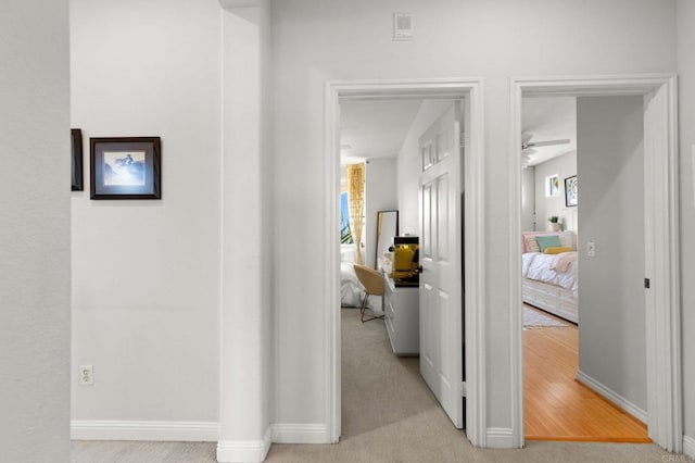 6497 Wayfinders Ct, Carlsbad, CA 92011 - hallway with baseboards