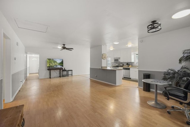 3168 Florine Dr, Lemon Grove, CA 91945 - living room with light wood finished floors, attic access, and ceiling fan