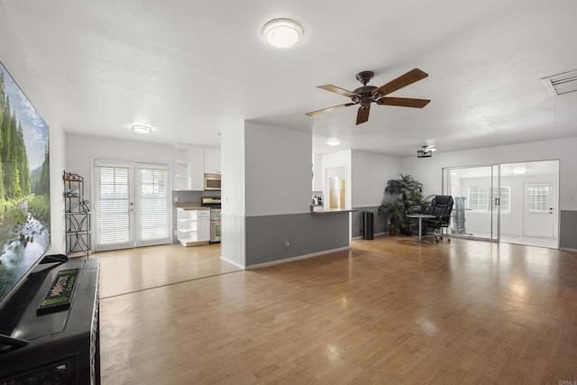 3168 Florine Dr, Lemon Grove, CA 91945 - living room featuring a ceiling fan and light wood-style floors