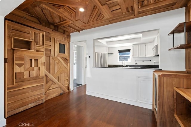 210 39th St, Newport Beach, CA 92663 - kitchen featuring stainless steel appliances, open shelves, dark countertops, white cabinets, and dark wood-style flooring