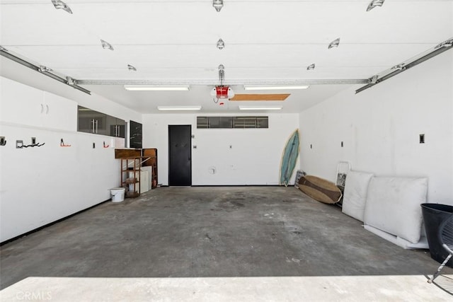 210 39th St, Newport Beach, CA 92663 - garage featuring a garage door opener