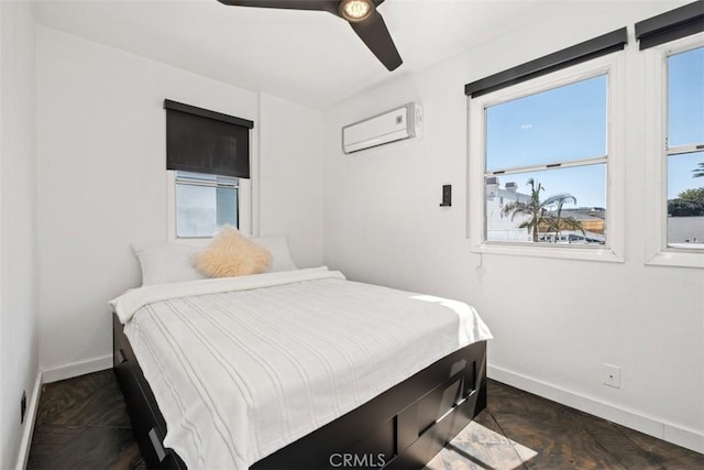 210 39th St, Newport Beach, CA 92663 - bedroom featuring baseboards, a wall unit AC, and multiple windows