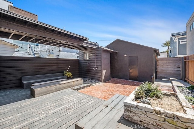 210 39th St, Newport Beach, CA 92663 - wooden terrace with a fenced backyard and an outbuilding
